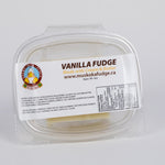 A quarter pound portion of Vanilla Fudge by Lucky Duck Fudge in a clear plastic tub and a label on the lid with the ingredients and nutritional facts.
