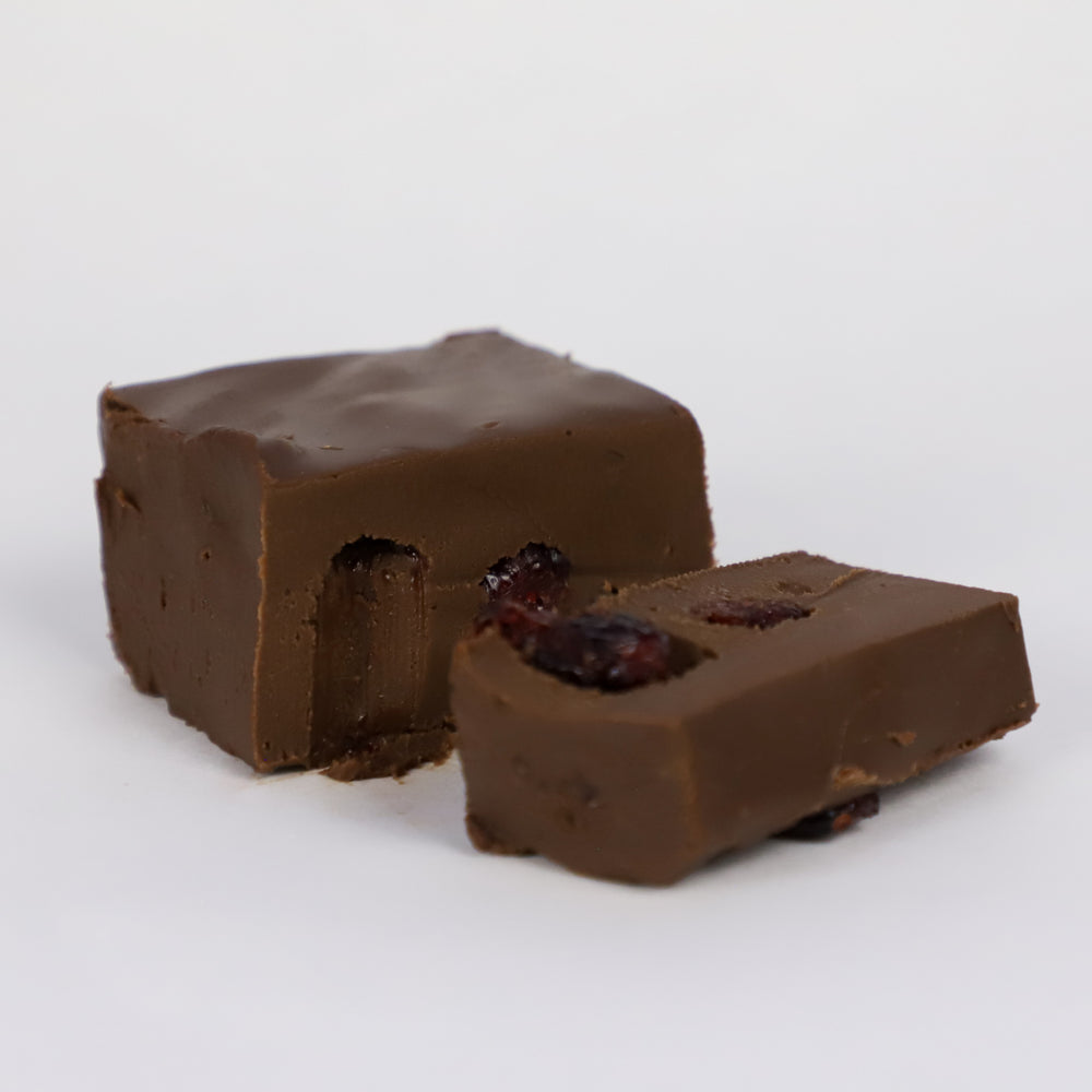 A quarter pound portion of Lucky Duck Fudge's Classic Chocolate Cranberry fudge.